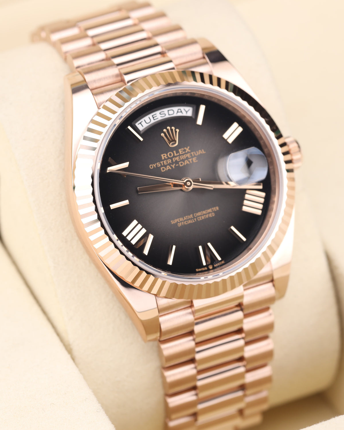 Editorial close-up of a rose-gold watch and bracelet